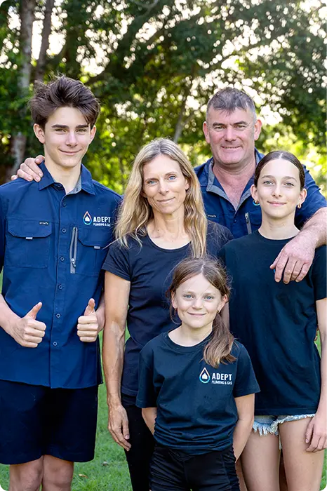 The Adept Plumbing & Gas family team in branded shirts
