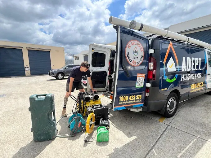 Emergency plumber in Logan arriving with a high-pressure water jet to clear blocked drain