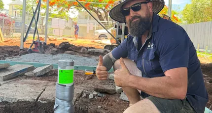 Adept Plumbing & Gas plumber setting out rough-in pipework on a Beenleigh building site