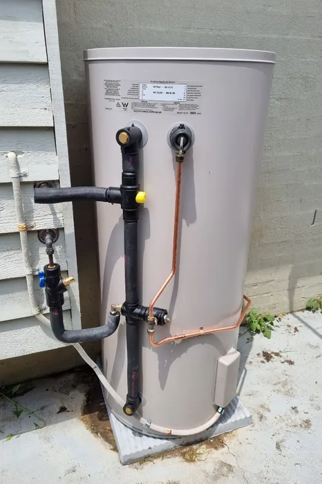 Electric hot water system installed outside a Calamvale home