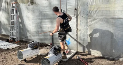Adept Plumbing & Gas plumber installing gas heating units on a Cornubia job