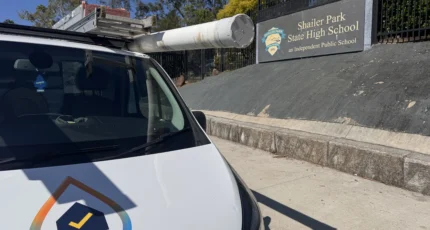 Adept Plumbing & Gas van outside Shailer Park State High School