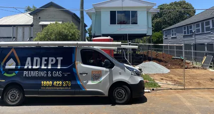 Adept Plumbing & Gas van parked on a Tarragindi street