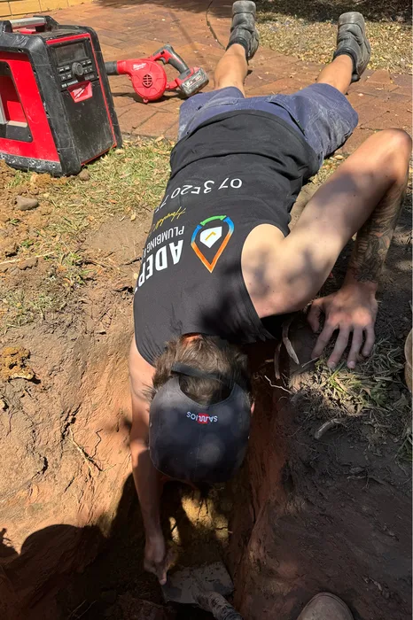 Adept Plumbing and Gas plumber locating an underground water leak