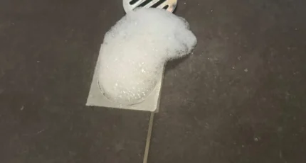 Floor waste drain in a tiled bathroom