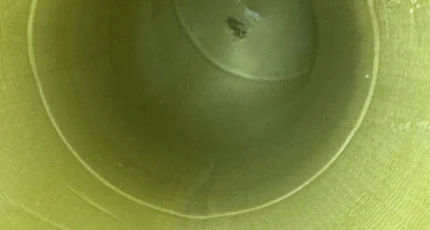 Final CCTV inspection showing a relining patch in place inside the drain