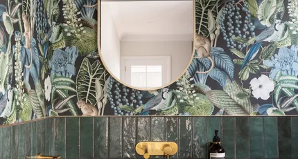 Powder room with a black basin and brass tapware in Annerley