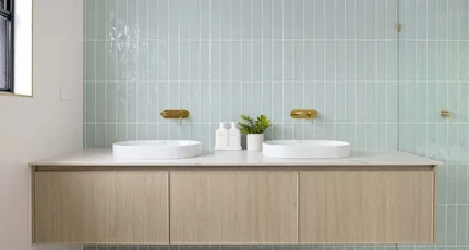 Double vanity with brass tapware in a renovated bathroom in Camp Hill