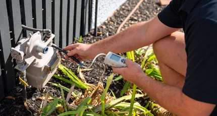 Plumber testing a gas meter in Camp Hill