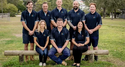 The Adept Plumbing & Gas team in a park in Camp Hill