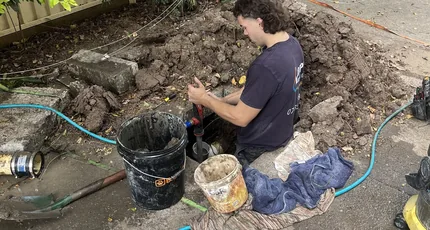 Adept Plumbing & Gas plumber excavating to repair a pipe in Carindale