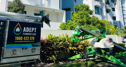 Adept Plumbing & Gas truck at an apartment complex in Carindale