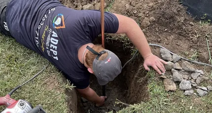 Adept Plumbing & Gas plumber repairing an underground water pipe in Carindale