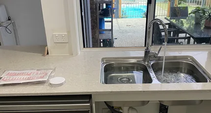Kitchen sink and dishwasher plumbing in a Cornubia home