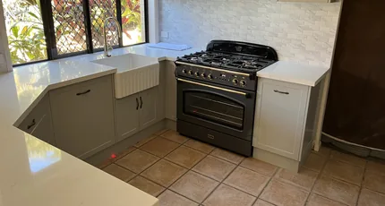 Kitchen with gas oven and cooktop connected in Greenslopes