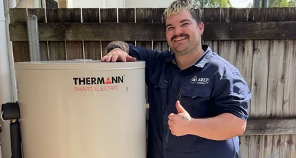 Adept Plumbing & Gas plumber with a new electric hot water system in Marsden