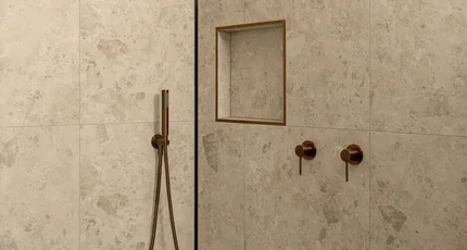 Shower with copper tapware and a recessed niche in Marsden