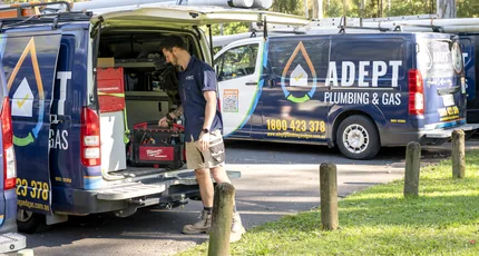 Adept Plumbing & Gas vans and plumber on a job in Marsden