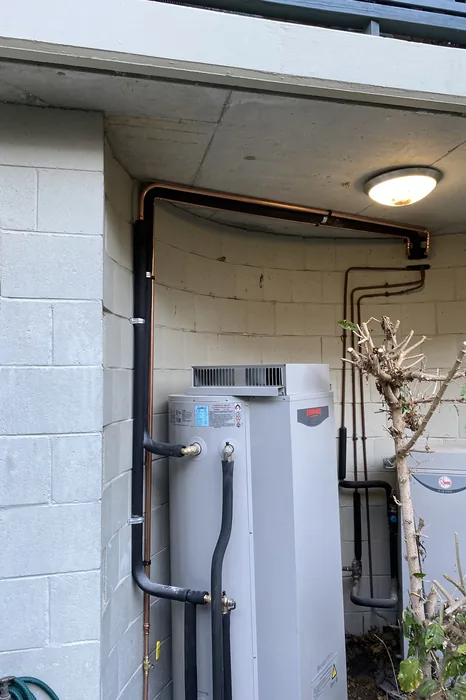 Body corporate gas hot water systems and gas lines in New Farm