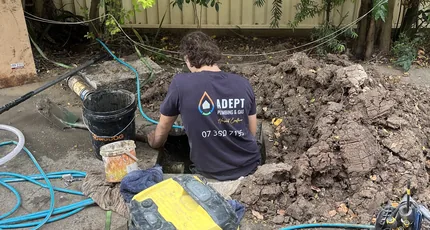 Adept Plumbing & Gas plumber excavating to repair a pipe in West End
