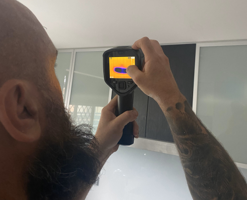 Adept Plumbing & Gas - leak detection plumber plumber doing inspection using a thermal camera