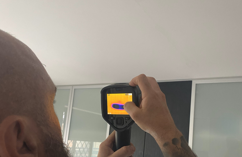 Adept Plumbing & Gas - leak detection plumber plumber doing inspection using a thermal camera