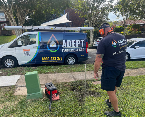 A licensed emergency plumber in Beenleigh performing professional leak detection.