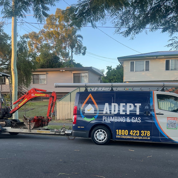 Adept Plumbing & Gas emergency plumber vehicle parked on site in Logan