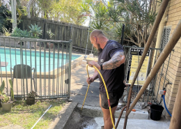 Plumber Logan using a CCTV drain camera to inspect the sewer drain