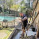 Blocked Drains Plumber Logan using a CCTV drain camera to inspect the sewer drain