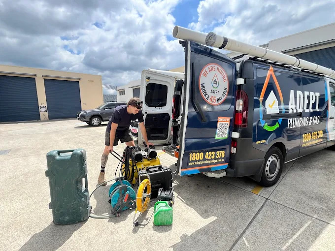 Emergency plumber in Logan arriving with a high-pressure water jet to clear blocked drain