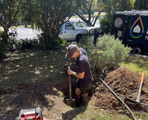 Adept Plumbing & Gas plumber working on an urgent plumbing repair in Logan